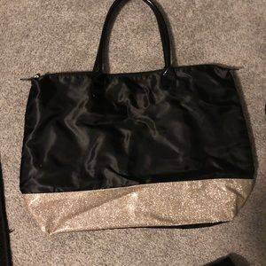 Black tote with gold accent